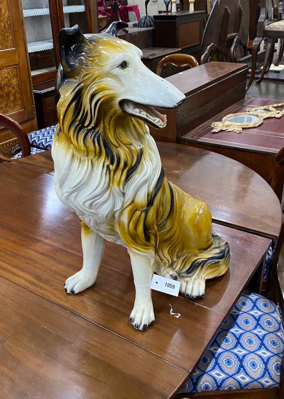 A mid 20th century ceramic figure of a seated collie, height 68cm